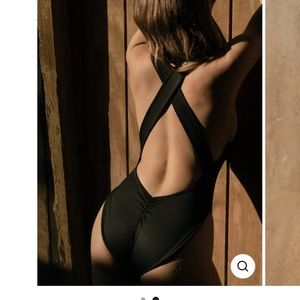 Londre swimsuit. NWT. Unworn. The cross back one piece in matte black